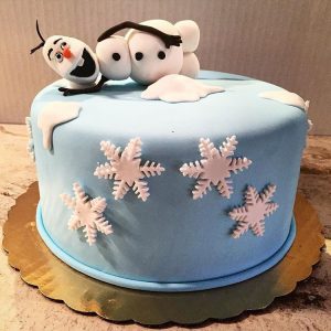 Custom Frozen themed cake with Olaf fondant figure and snowflake decorations, Mia's Brooklyn Bakery NYC