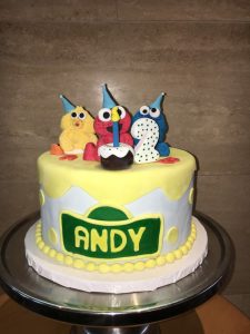Custom Sesame Street birthday cake with Big Bird, Elmo, and Cookie Monster fondant figures, Mia's Brooklyn Bakery NYC