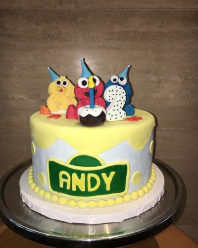 Custom Sesame Street birthday cake with Big Bird, Elmo, and Cookie Monster fondant figures, Mia's Brooklyn Bakery NYC