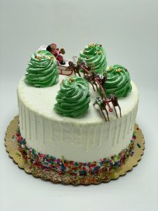 savor the flavor of a Christmas Santa Sleigh Cake at Mia's Bakery.