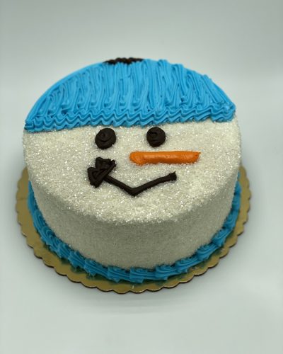 savor the classic flavor of a snowman oreo cake at Mia's Bakery.