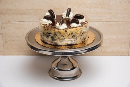 savor the classic flavor of a traditional oreo cheesecake at Mia's Bakery.