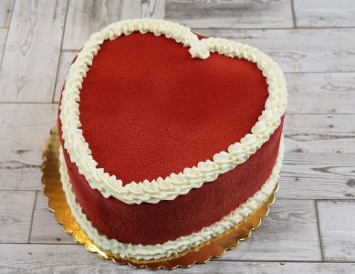 savor the classic flavor of a red velvet heart cake at Mia's Bakery.