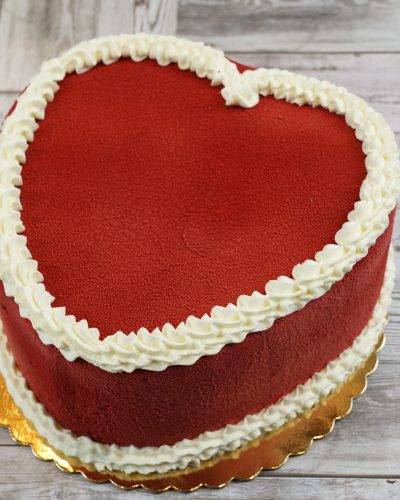 savor the classic flavor of a red velvet heart cake at Mia's Bakery.