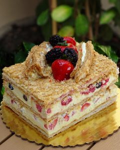 savor the classic flavor of a traditional napoleon cake at Mia's Bakery.