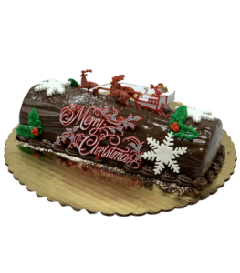 Chocolate raspberry Buche de Noel Yule log cake with Christmas decorations, Mia's Brooklyn Bakery NYC
