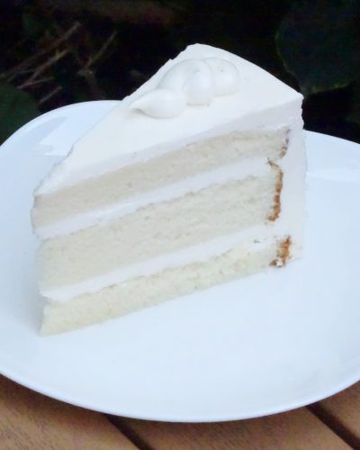 savor the classic flavor of a traditional vanilla bean cake slice at Mia's Bakery.