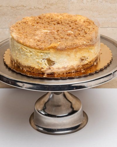 savor the classic flavor of a traditional New York style apple cheesecake at Mia's Bakery.