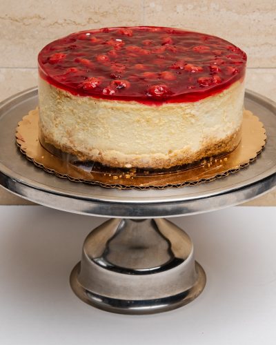 savor the classic flavor of a traditional New York style cherry cheesecake at Mia's Bakery.