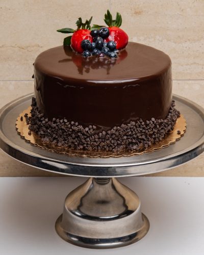 savor the classic flavor of a traditional chocolate layer cake at Mia's Bakery.