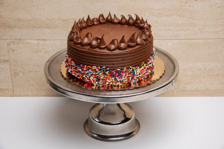 savor the classic flavor of a homemade chocolate fudge cake at Mia's Bakery.