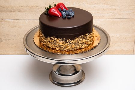 savor the classic flavor of a homemade chocolate mousse cake at Mia's Bakery.