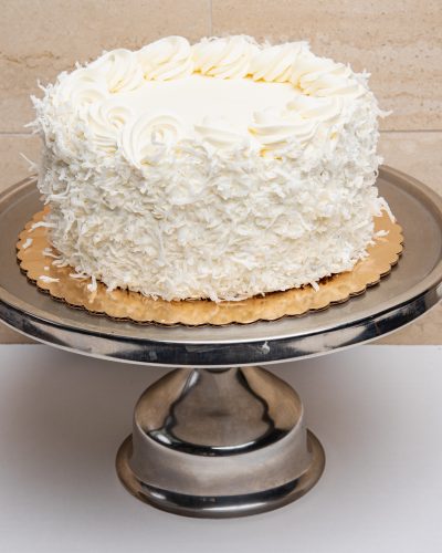 savor the classic flavor of a traditional coconut cake at Mia's Bakery.