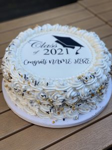 savor the classic flavor of a custom graduation cake at Mia's Bakery.