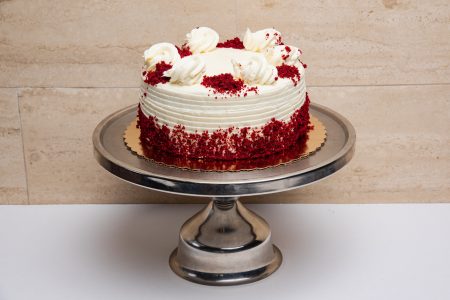 savor the classic flavor of a traditional red velvet cake at Mia's Bakery.