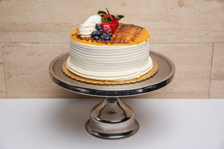 savor the classic flavor of a homemade salted caramel cake at Mia's Bakery.