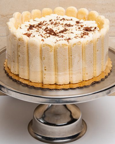 savor the classic flavor of a traditional tiramisu at Mia's Bakery.