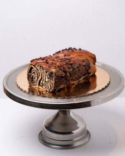 savor the classic flavor of a traditional chocolate babka at Mia's Bakery.