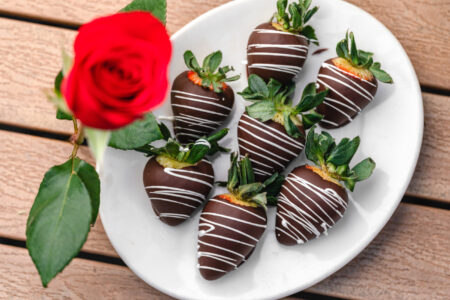 savor the classic flavor of traditional chocolate covered strawberries at Mia's Bakery.
