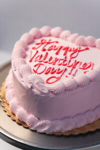 savor the classic flavor of a chocolate strawberry heart cake at Mia's Bakery.