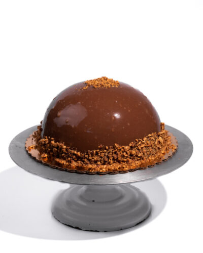 savor the classic flavor of a gluten-free hazelnut marquise cake at Mia's Bakery.