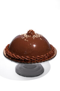 savor the classic flavor of a gluten-free milk chocolate panna cotta at Mia's Bakery.