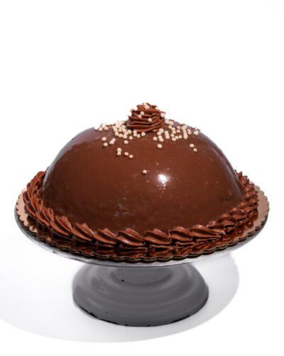 savor the classic flavor of a gluten-free milk chocolate panna cotta at Mia's Bakery.