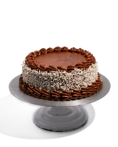 savor the classic flavor of a vegan chocolate fudge cake at Mia's Bakery.