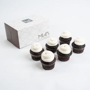 Chocolate cupcakes with vanilla frosting from Mia's Bakery