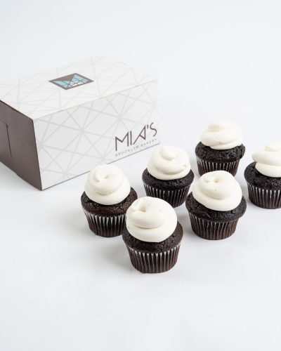 Chocolate cupcakes with vanilla frosting from Mia's Bakery