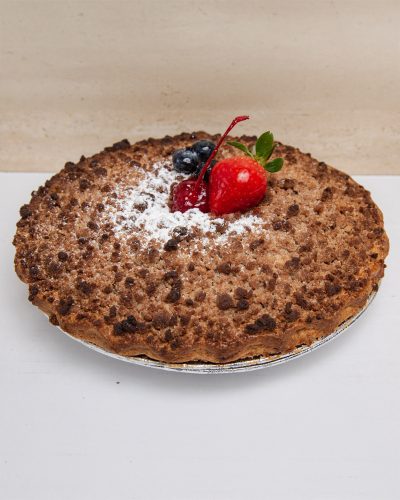 savor the classic flavor of a traditional triple berry crumb pie at Mia's Bakery.