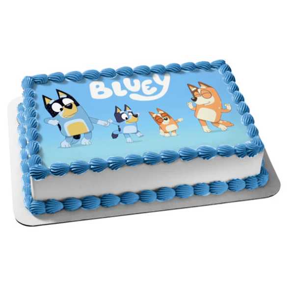Rectangular edible image cake featuring Bluey cartoon characters on white frosting, surrounded by blue piped borders. This custom photo cake from Mia's Bakery showcases Bluey, Bingo, and their parents in a playful scene on the edible printed topper. Perfect for children's birthday parties and Bluey-themed celebrations.