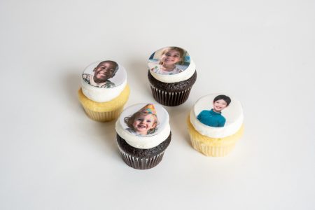 savor the classic flavor of edible image cupcakes at Mia's Bakery.