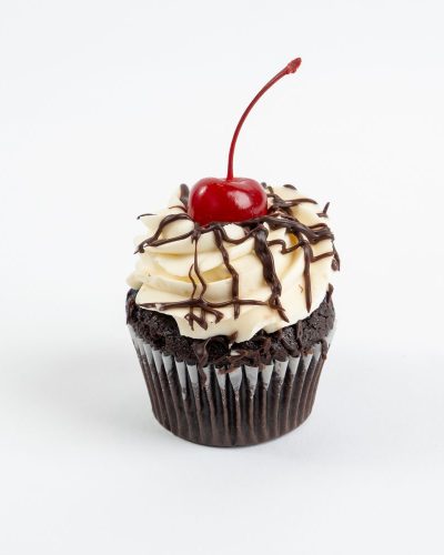 Black forest cupcake with vanilla frosting, chocolate drizzle, and cherry on top, Mia's Brooklyn Bakery NYC