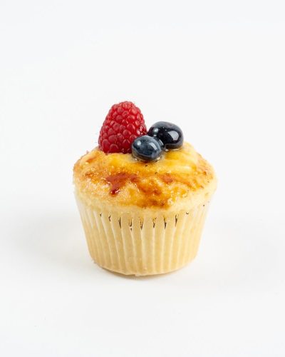 Creme brulee cupcake with torched sugar top and fresh berries, Mia's Brooklyn Bakery NYC