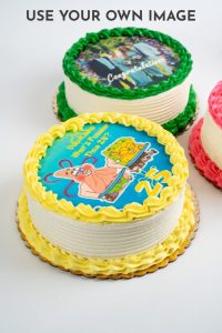 savor the classic flavor of a gluten free edible image cake at Mia's Bakery.