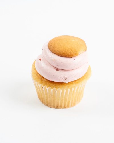 Strawberry banana cupcake with pink strawberry frosting and vanilla wafer topping, Mia's Brooklyn Bakery NYC